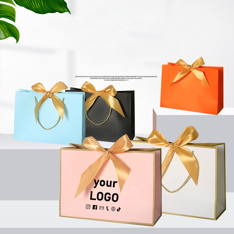 

Minimum order of 10 pieces gift handbag paper bag universal clothing bag cosmetic packaging bag gift bag printing logo