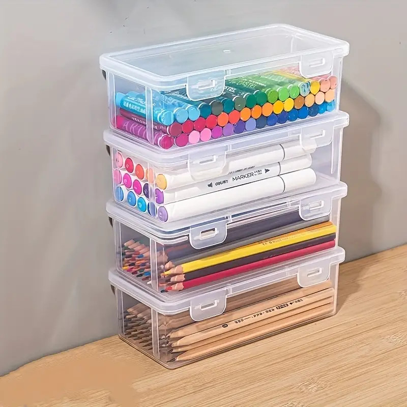 

4 large transparent PP storage boxes with lids, used for storing office supplies, pencils, and crafts