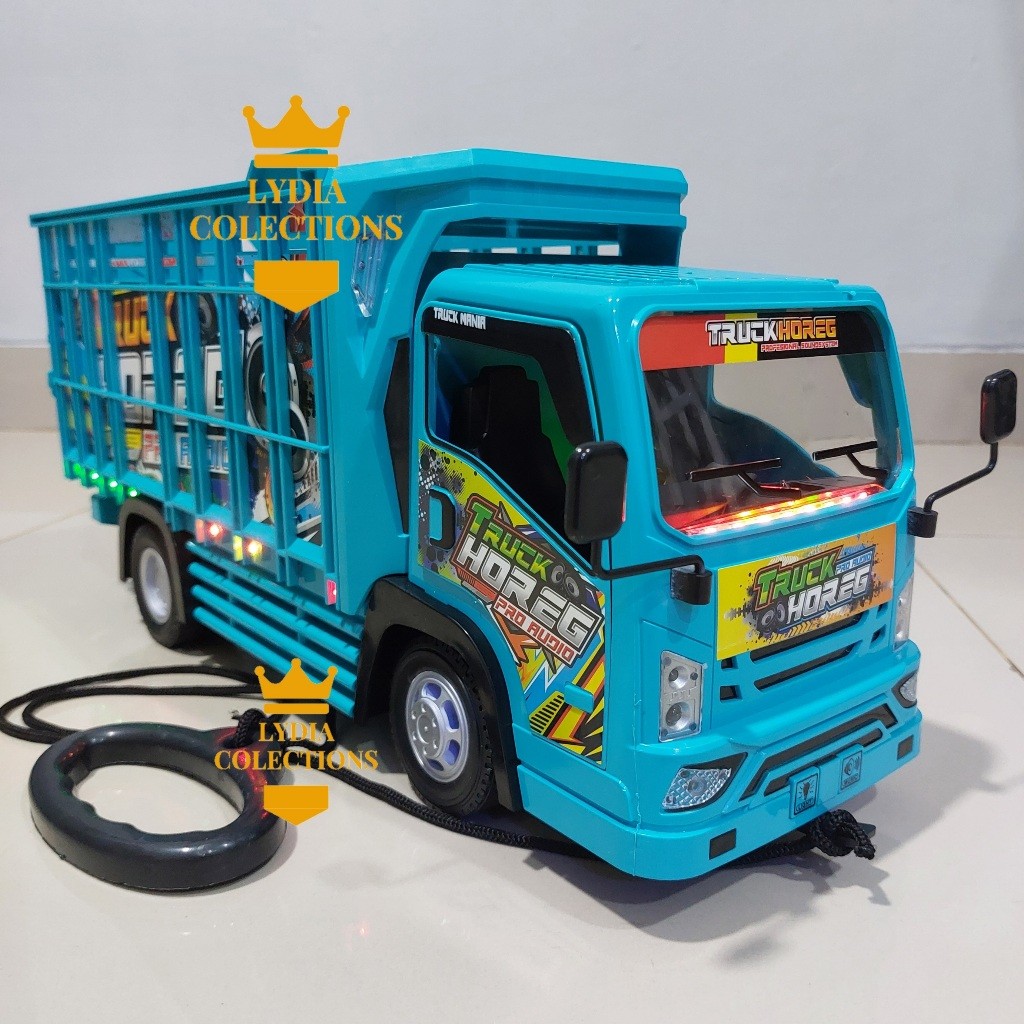 Mainan Truk Basuri Oleng Telolet Jumbo Lampu Bisa Tarik