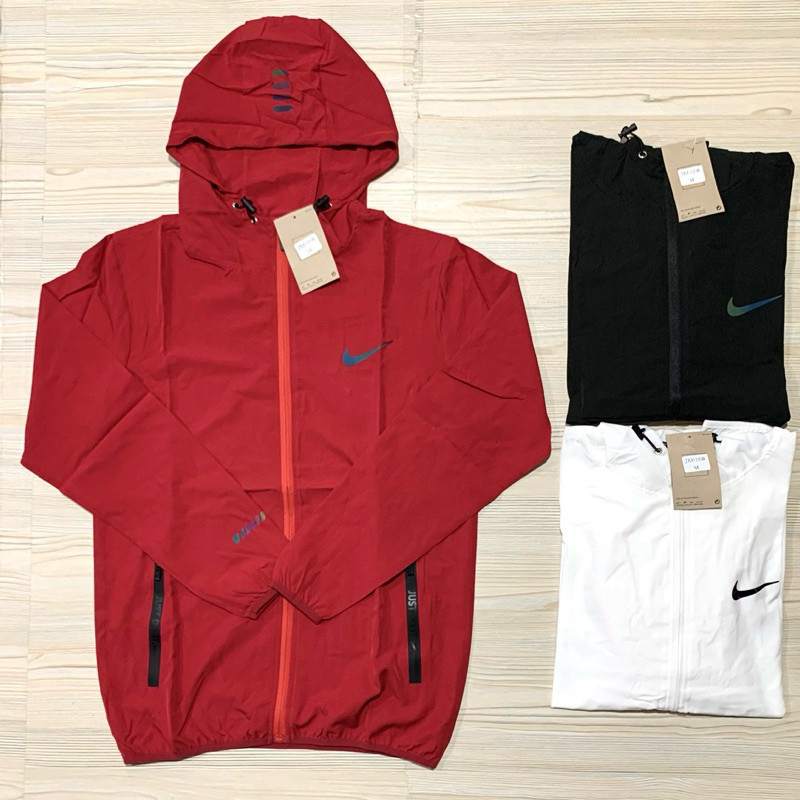 JAKET MICRO PARASUT NIKE IMPORT PREMIUM OLAHRAGA RUNNING PRIA MAN HOODIE KUPLUK TOPI LENGAN PANJANG 