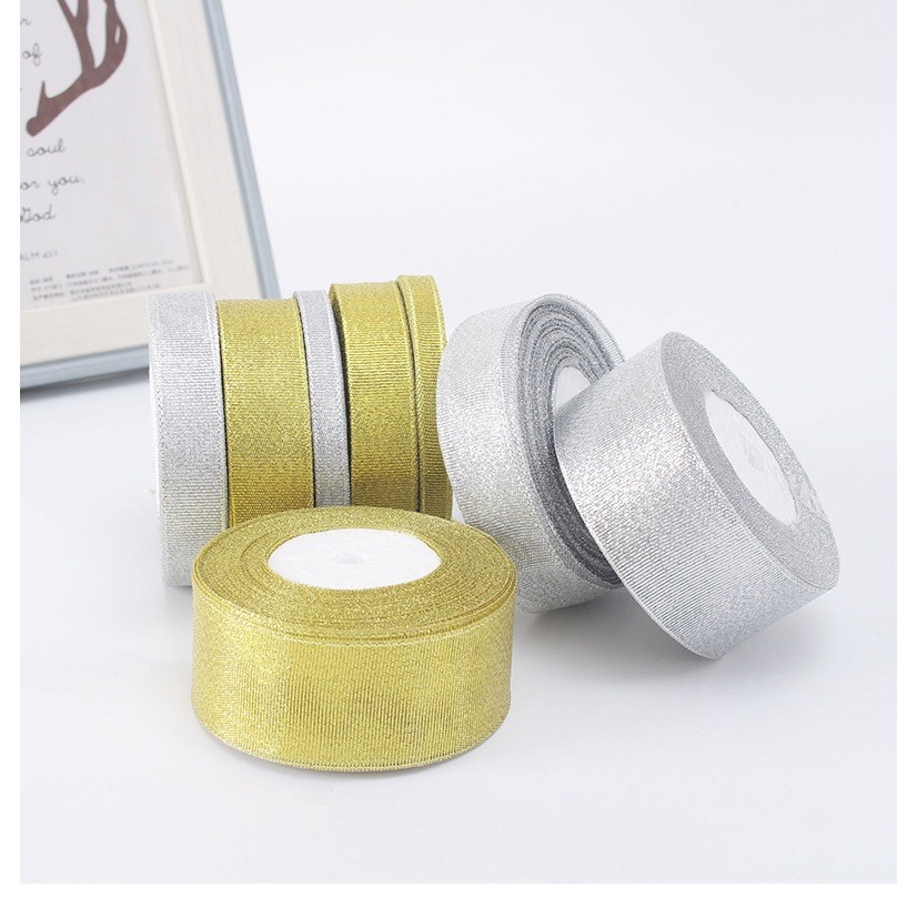 

PITA GLITTER EMAS DAN PERAK GLITTER RIBBON GOLD SILVER (22M/ROLL)