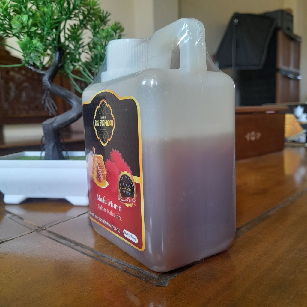 

Madu Asy Syahadah Nektar Kaliandra 500gram Jaminan Murni 100% Toko Herbal Optimis