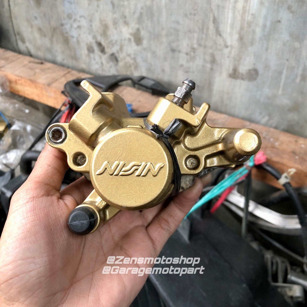 Kaliper Rem Belakang Supra X 125 Set Ori Copotan