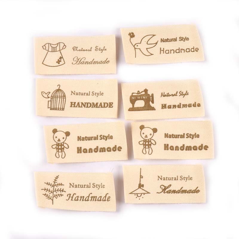 

50Pcs Mix Printed Cartoon Beige Cotton Woven Labels For DIY Sewing Supplies Clothing Care Labels Washable Garment Tags 42x20mm