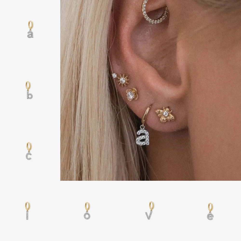 U-C Fashion,Anting giwang titanium, anting giwang monogram, anting giwang tunggal, anting wanita.