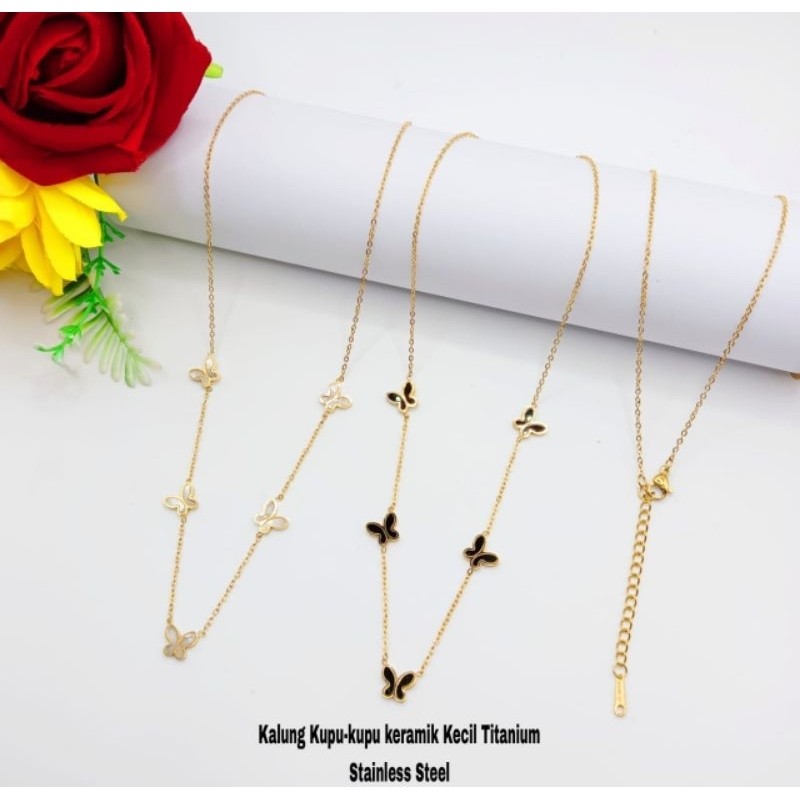 kalung kupu kupu titanium wanita