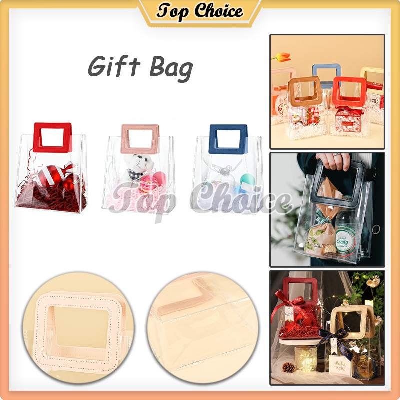 

Tas Mika PVC Bening Gagang Kulit / Gift Bag / Tas Hampers Bening