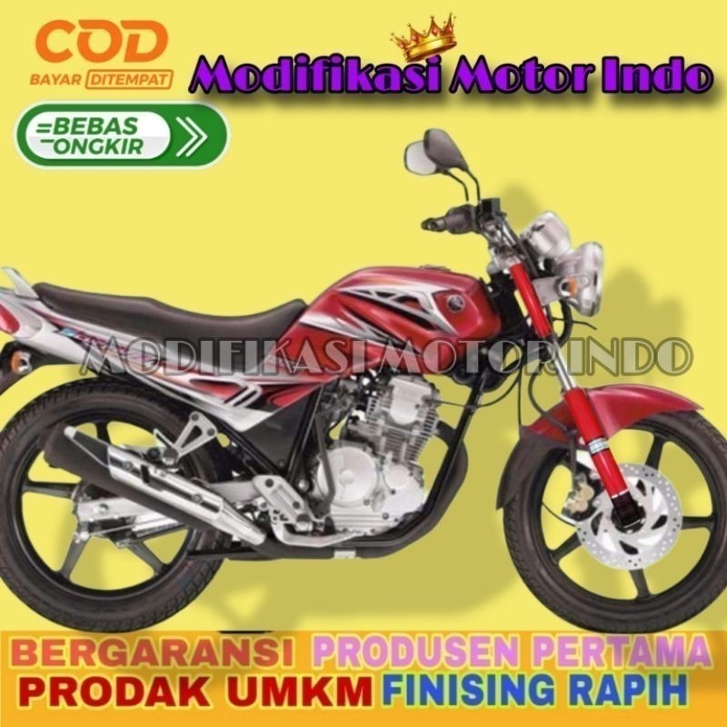 cover shock depan Scorpio cover shock