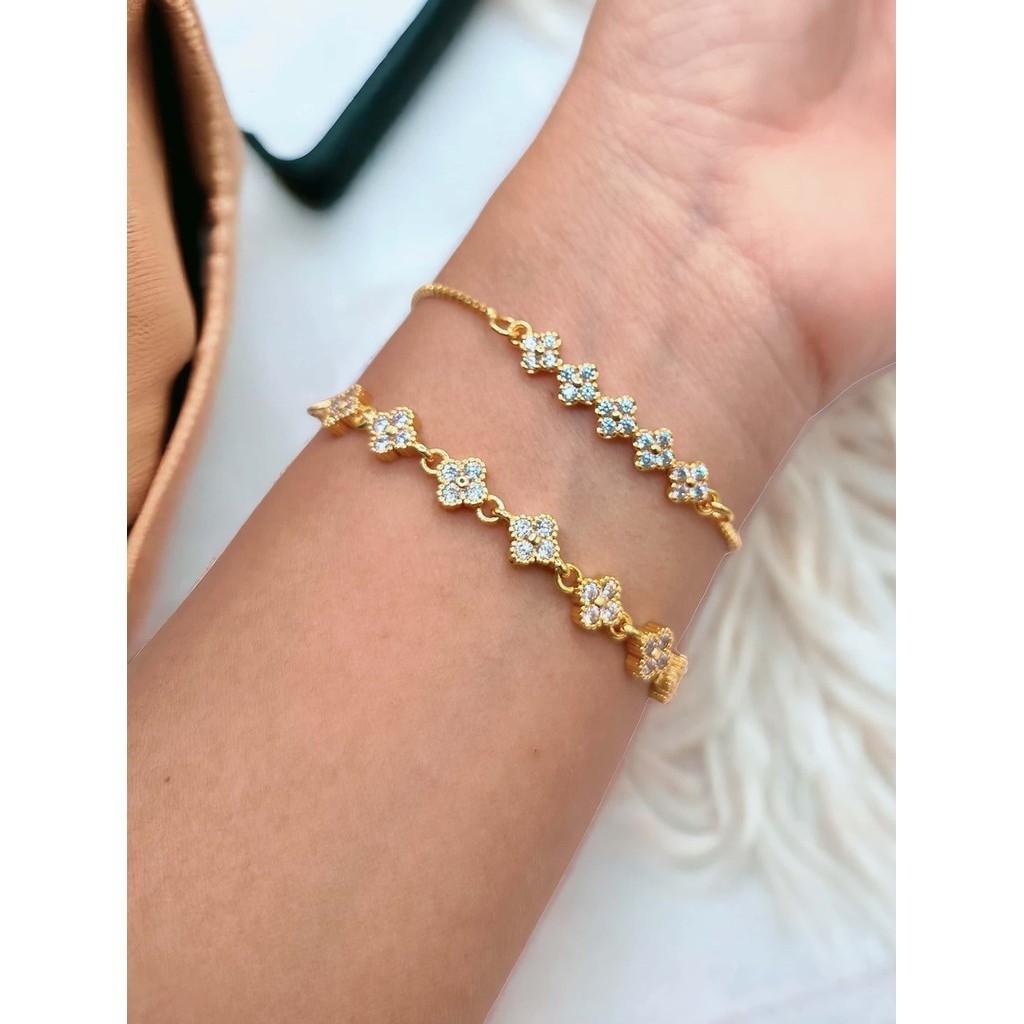 gelang serut wanita motif bunga mata putih xuping