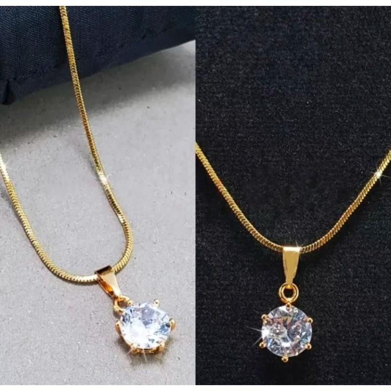kalung belut titanium gold liontin mata satu Kulit Perhiasan