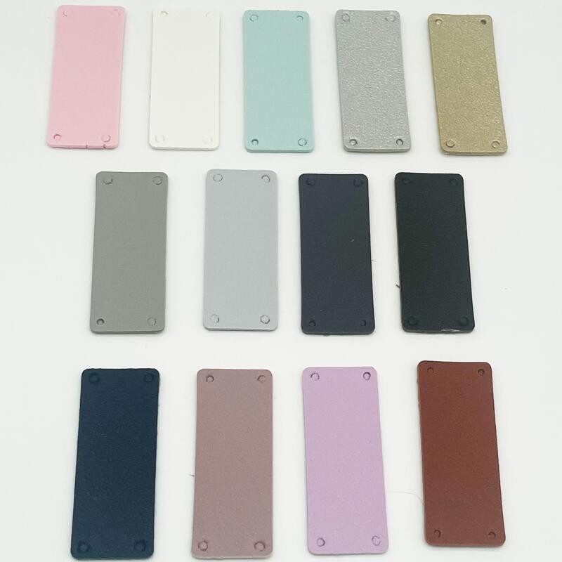 

20pcs/lot Embossed PU Leather Labels 2*5cm Multicolor Blank Label For Sewing Accessories DIY Garment Bags Material Tags