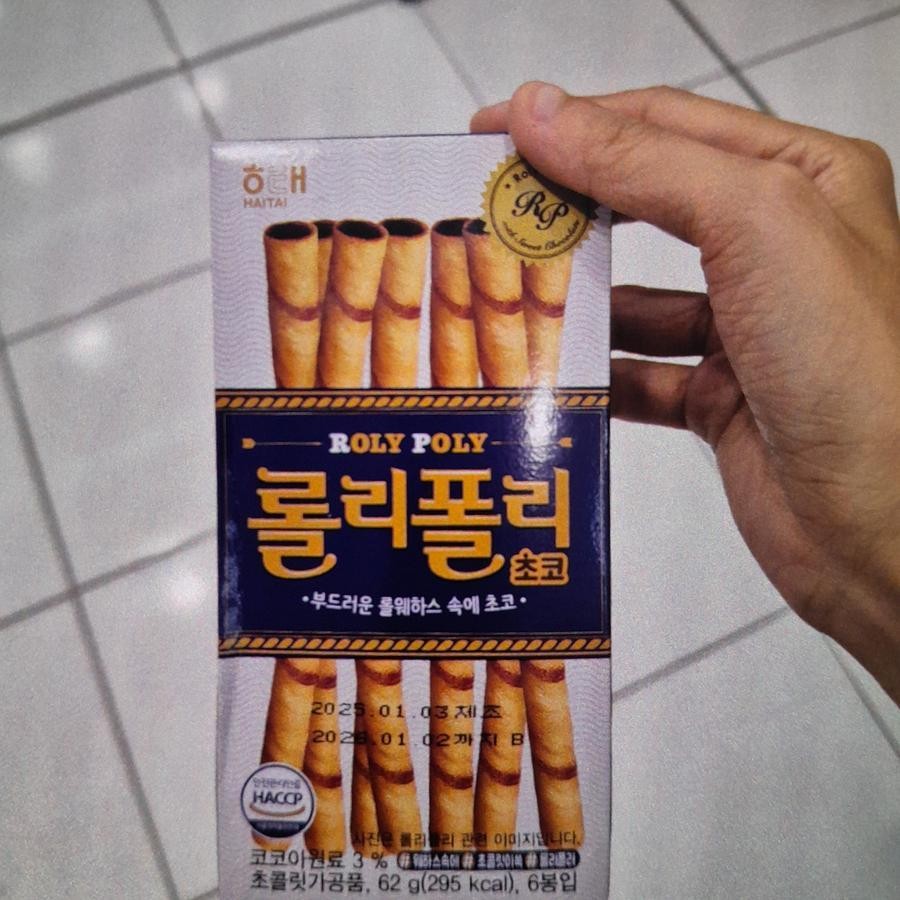 

Haitai Roly Poly Wafer Roll Chocolate Import 62gr
