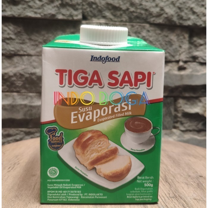 

tiga sapi susu evaporasi 500 gram x 12 pcs per karton KARTONAN