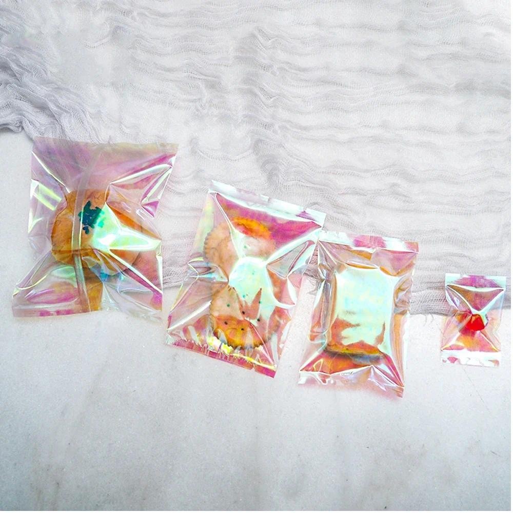 

100Pcs Holographic Rainbow Mini Plastic Packaging Bags Three Side Seal Pouches with Tear Notch Sugar Powder Capsule Sample