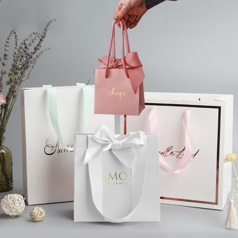 

Wholesale custom printed paper bags with logo Luxury gift shopping bags boutique euro tote bags manufacturer