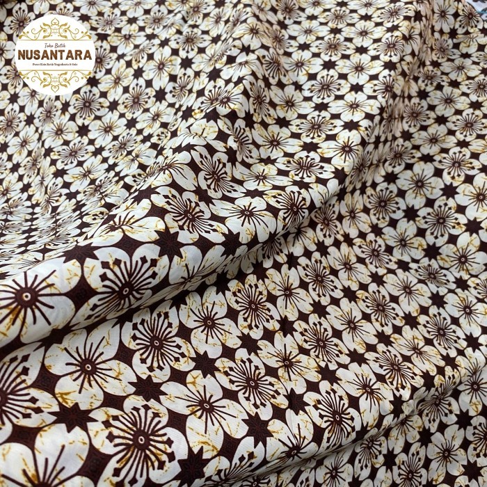 kain batik jarik motif kawung latar putih coklat bahan katun nusantara
