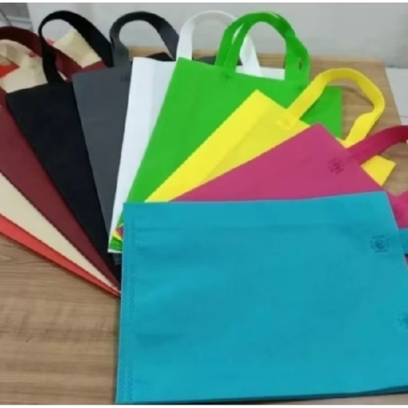 

Paket 10 Lusin Tas Spunbond / Goodie bag Spunbond Handle 25x35