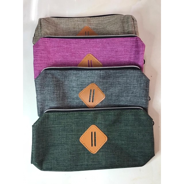 

Tempat Pensil Kain Polos Resleting Warna