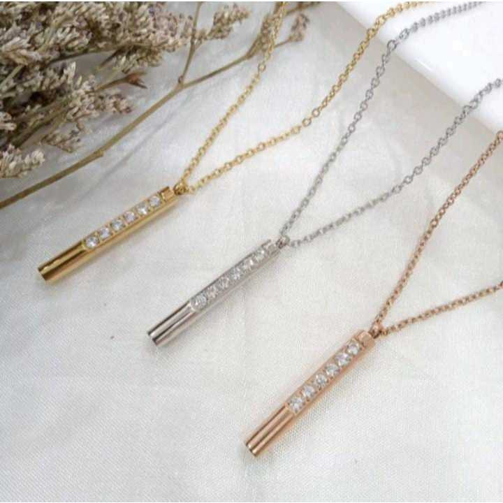 Kalung titanium fashion pria wanita liontin panjang mata