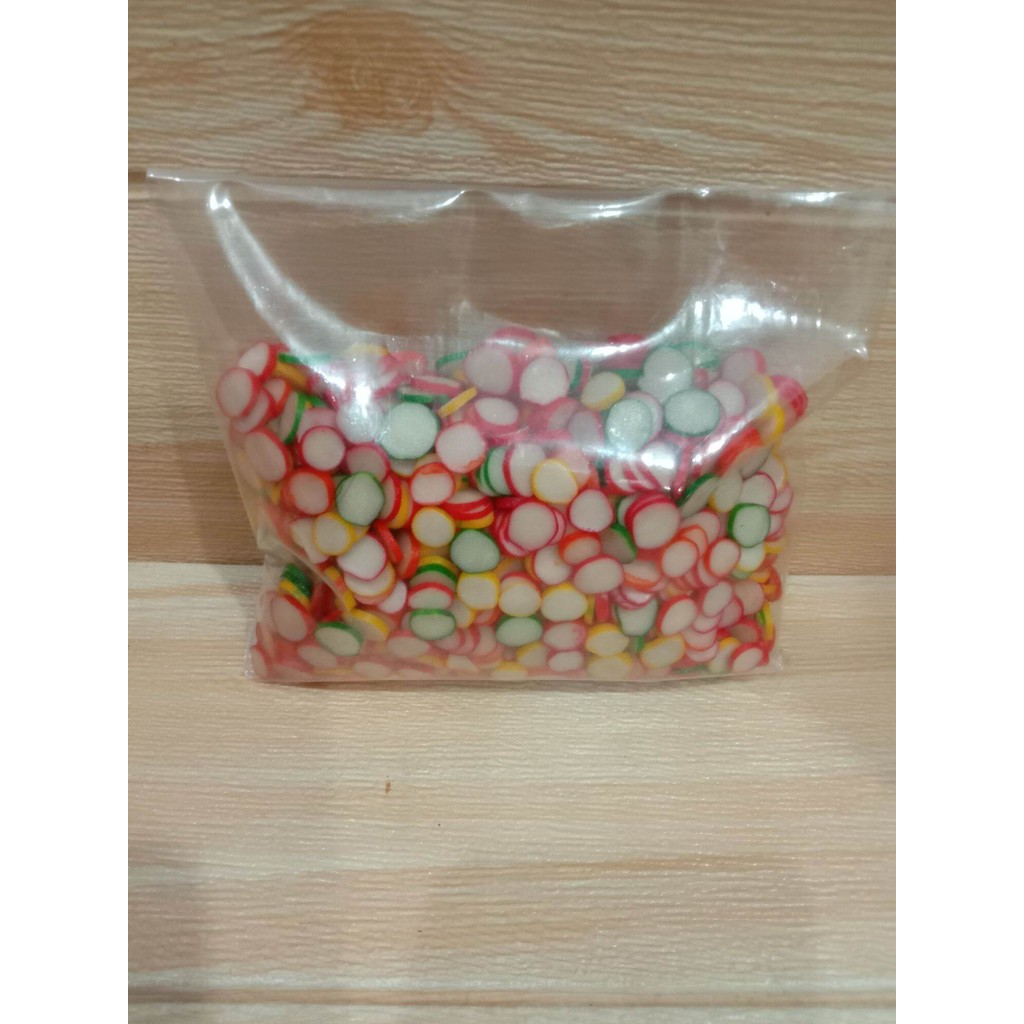 

Kerupuk mentah rasa bawang bentuk kancing 250 gram