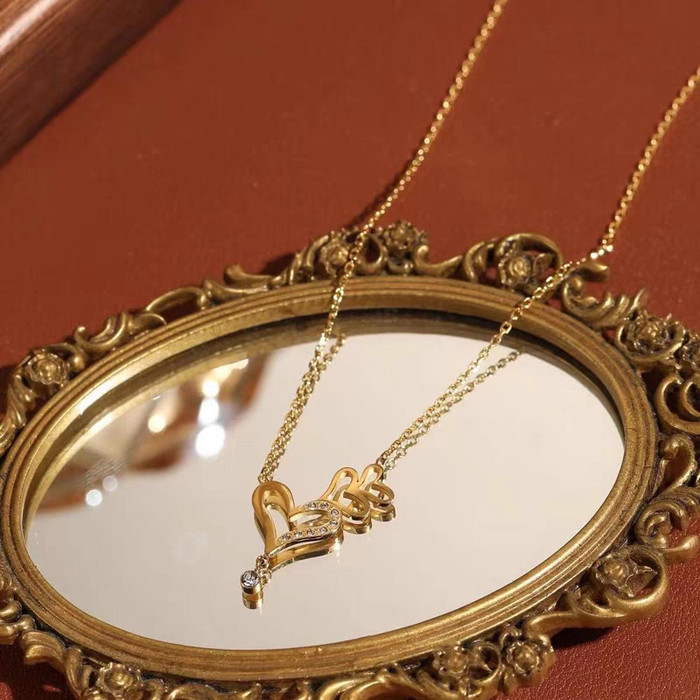 kalung titanium love besar love kecil