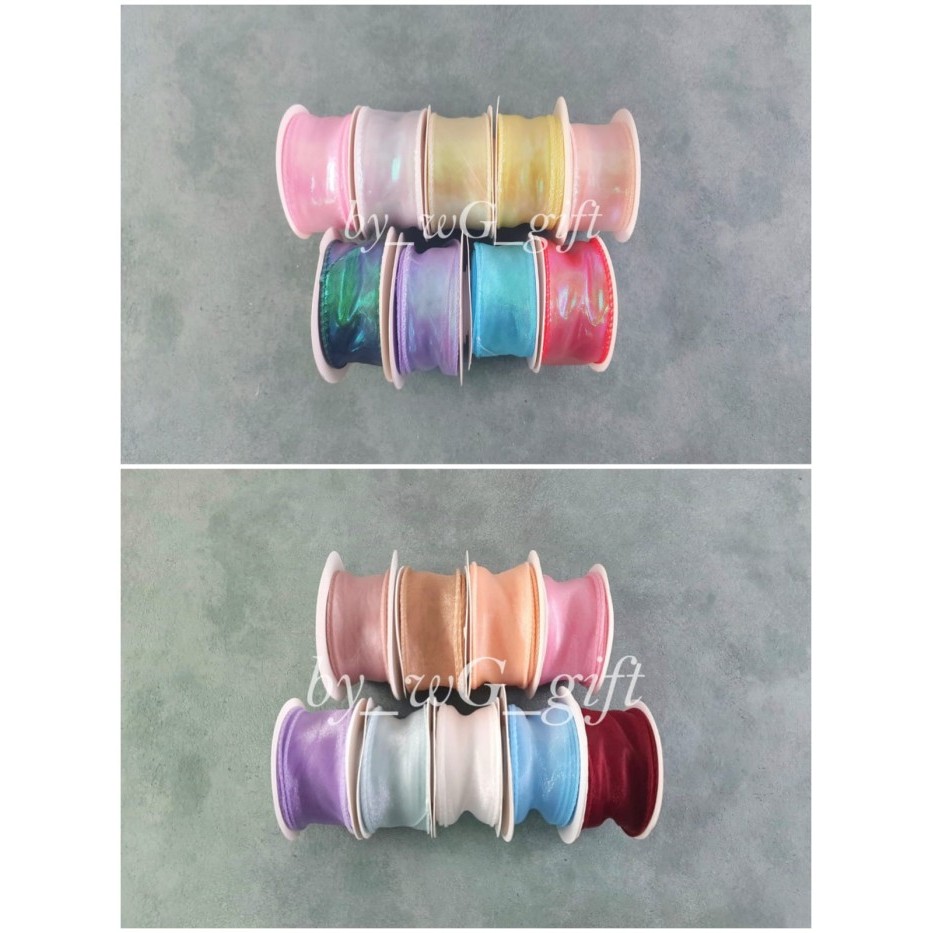 

Pita Organdi Pelangi ; Lebar 3.8 cm Panjang 10 Yard ; Mix Colour ; 1 Pack = 1 Piece