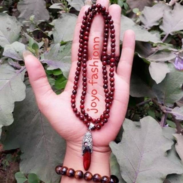 Kalung Tasbih Akar Bahar tembus cahaya liontin Taring