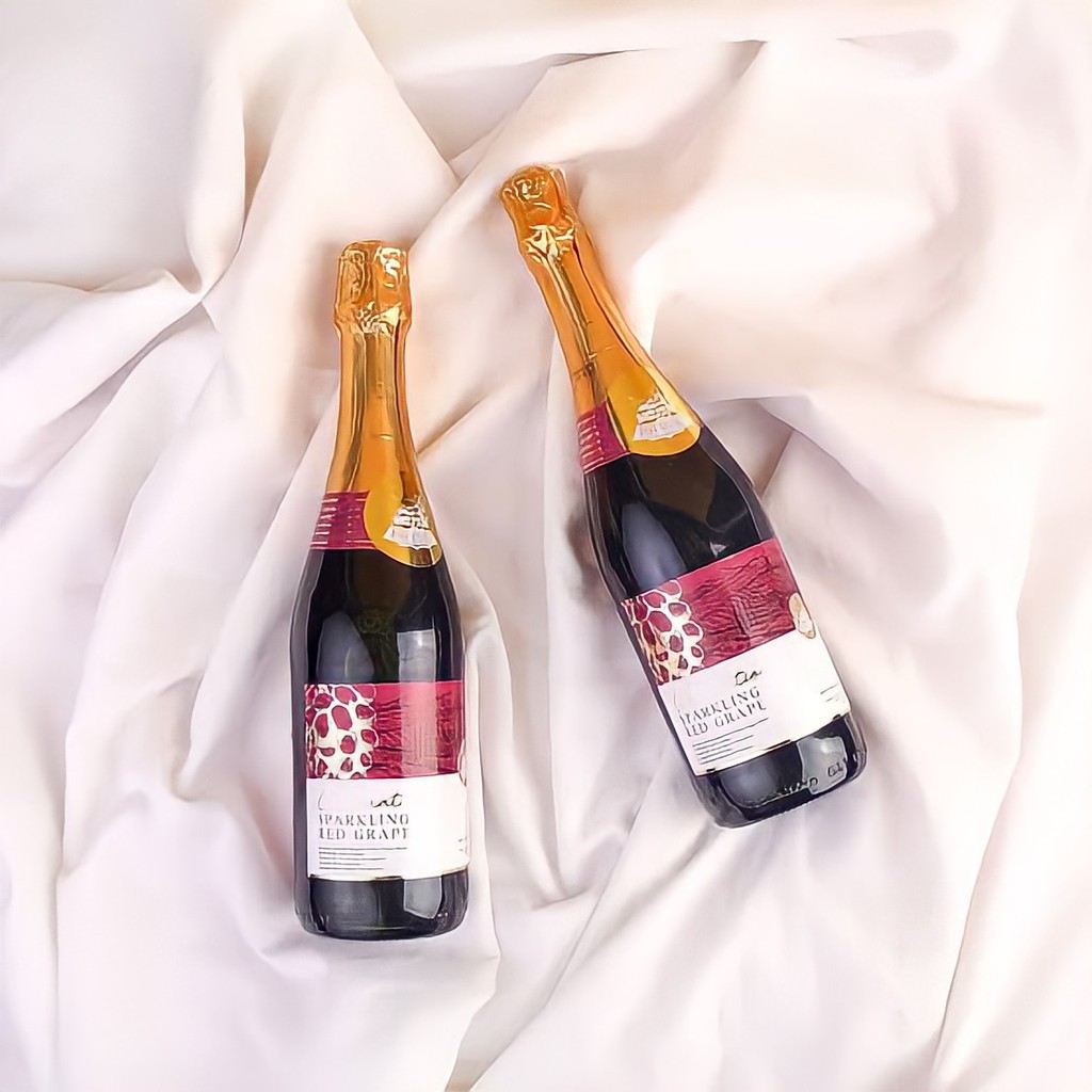 

STAR VILLAGE SPARKLING RED GRAPE JUICE / JUS ANGGUR SODA NON ALKOHOL