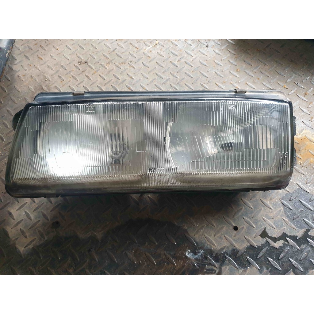 headlamp lampu depan kiri Mitsubishi Eterna 1990