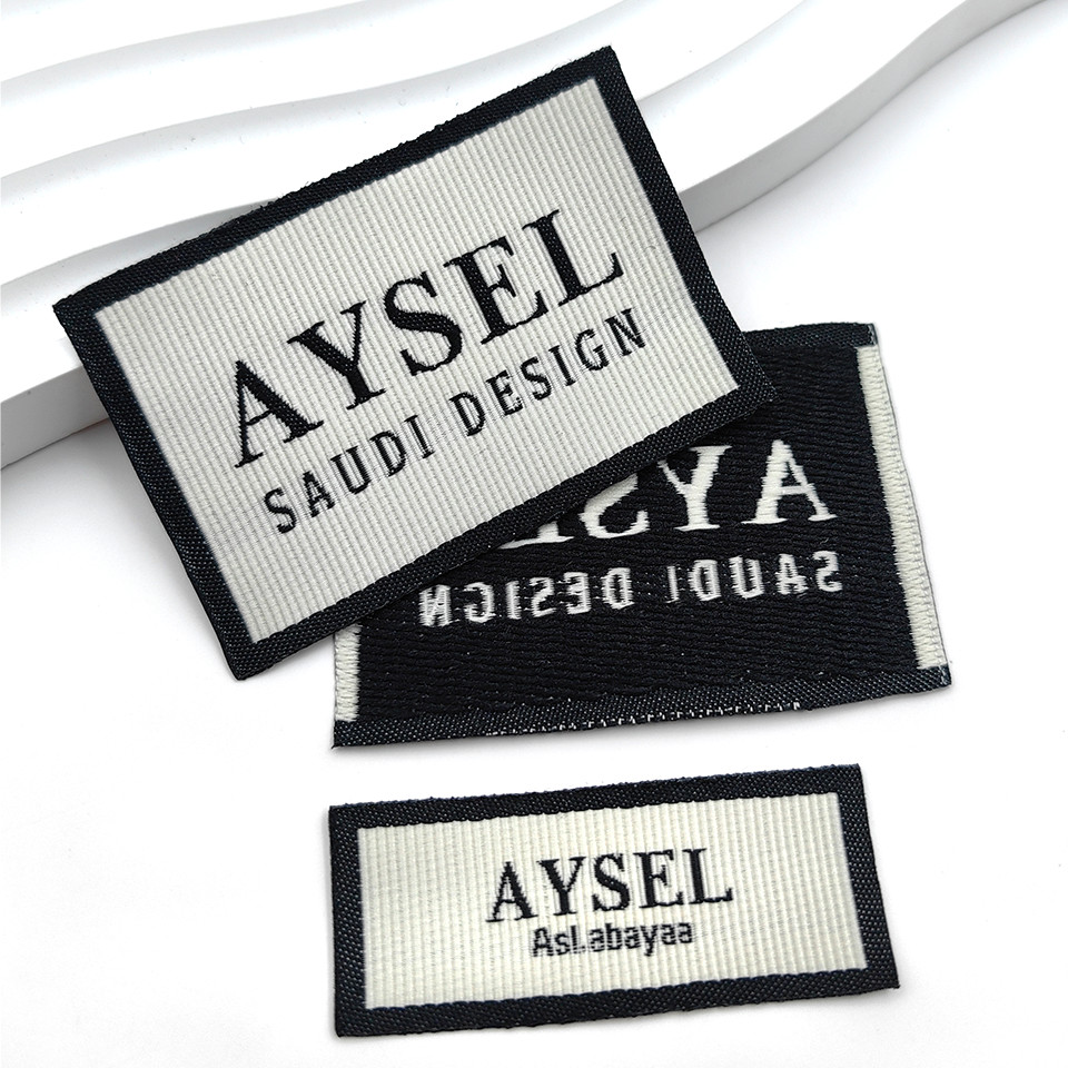 

Luxury Custom Woven Labels for Clothing Cut and Fold Textured Damask Embroidery Label Woven Neck Tags Sew on Collar