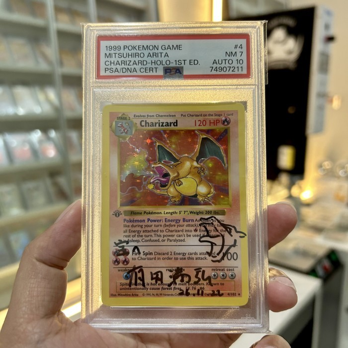 DP 3% untuk Charizard 1st edition shadowless PSA 7 AUTO 10 mitsuhiro arita signature english kartu P