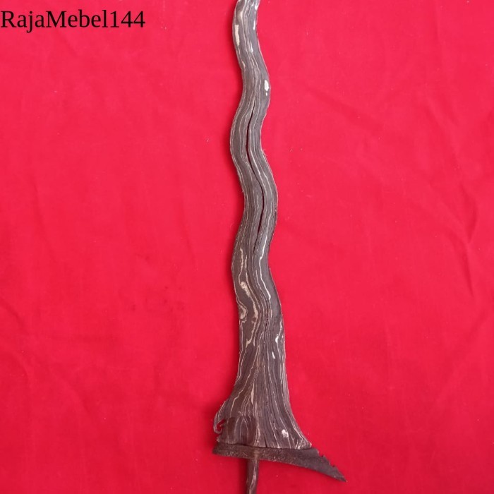 

Keris pamengkang Jagad manis laris