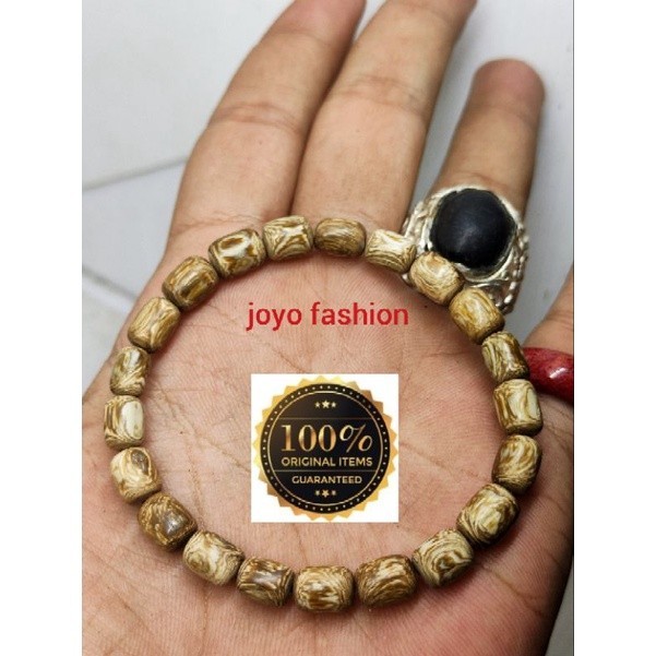 GELANG TASBIH FOSIL AKAR BAHAR PUTIH MEMBATU