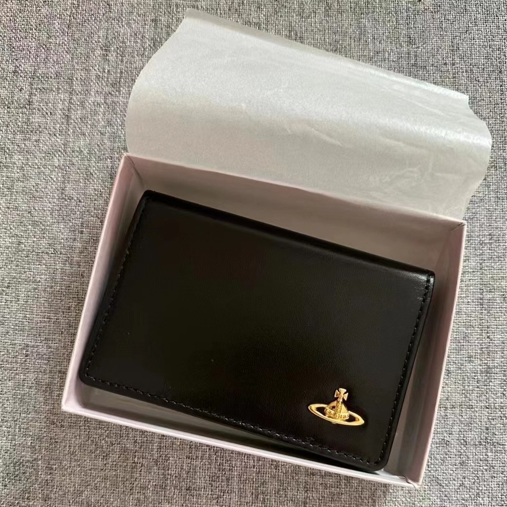 

Vivienne Dompet Panjang Warna Solid Kulit Sapi Logo Saturnus