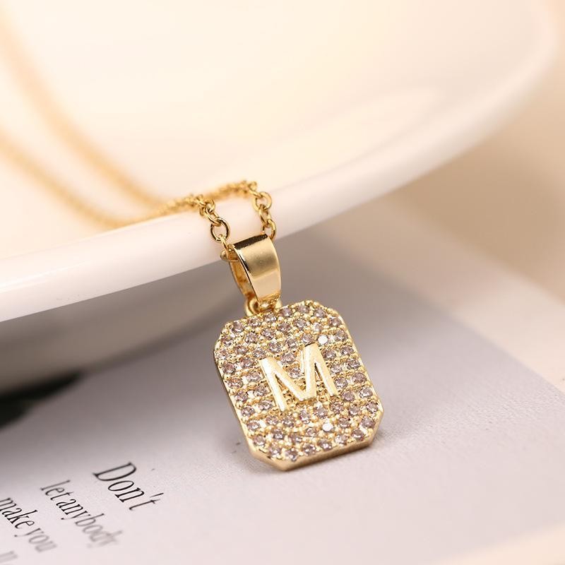 Kalung huruf M, titanium, tahan warna