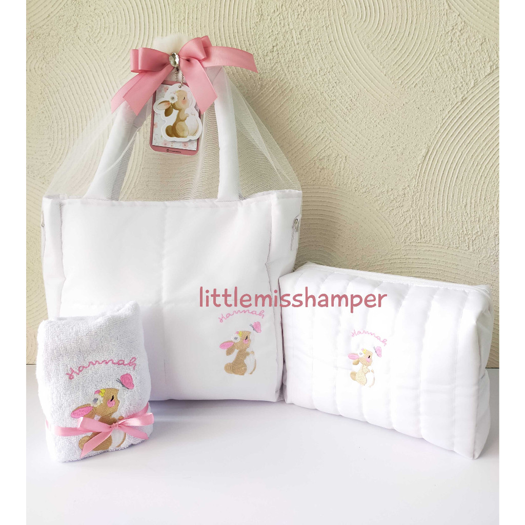 

Paket Tas Puffy isi pouch Puff dan handuk bordir Tile pita baby one month hardtag