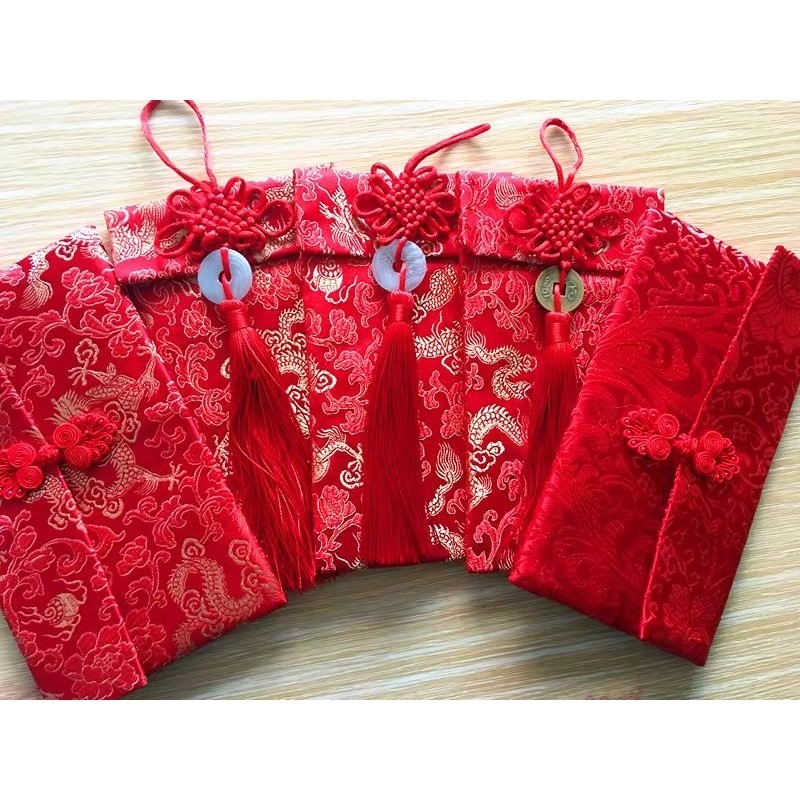 

READY stock siap kirim INSTAN atau SAMEDAY angpao hongpao premium imlek sinchia red kain cheongsam model dompet tebal ada kancing dan furing High Quality