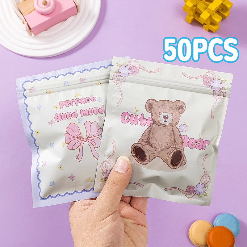 

50pcs Ziplock Plastik Cute Bear Sealed Bag Candy Aksesoris Mini Kawaii Party Packaging Travel Organizer Multifungsi