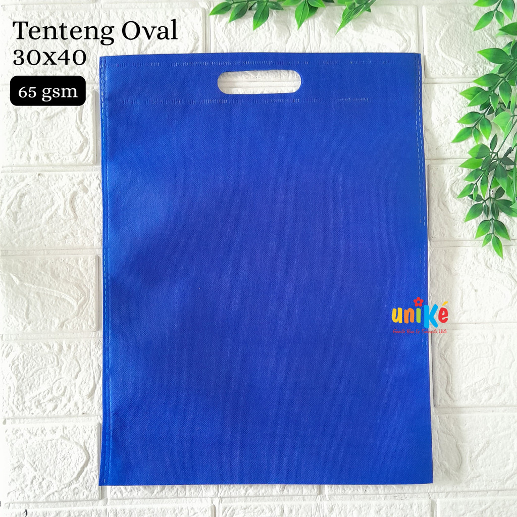 

65 GSM Tas Spunbond Press Tenteng Oval 30x40 Goodie Bag Seminar Bingkisan Souvenir Ulang Tahun