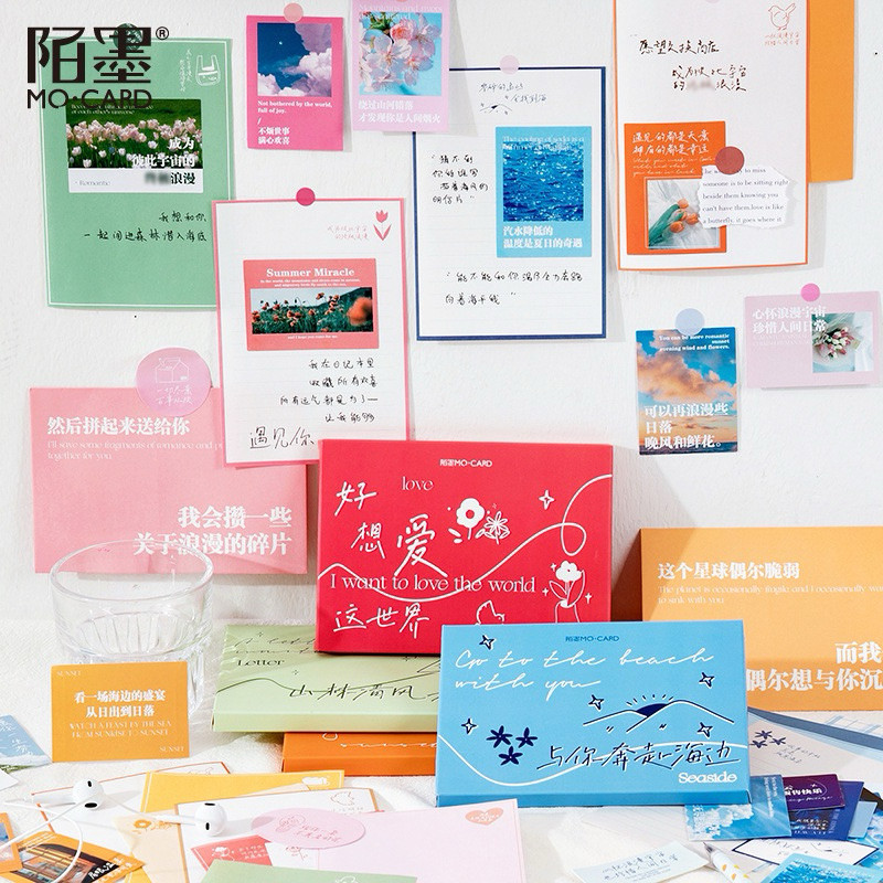 

Journamm.id Set kop surat kotak bahan campuran Momo, set buku catatan menulis surat seri puisi romantis, 4 jenis