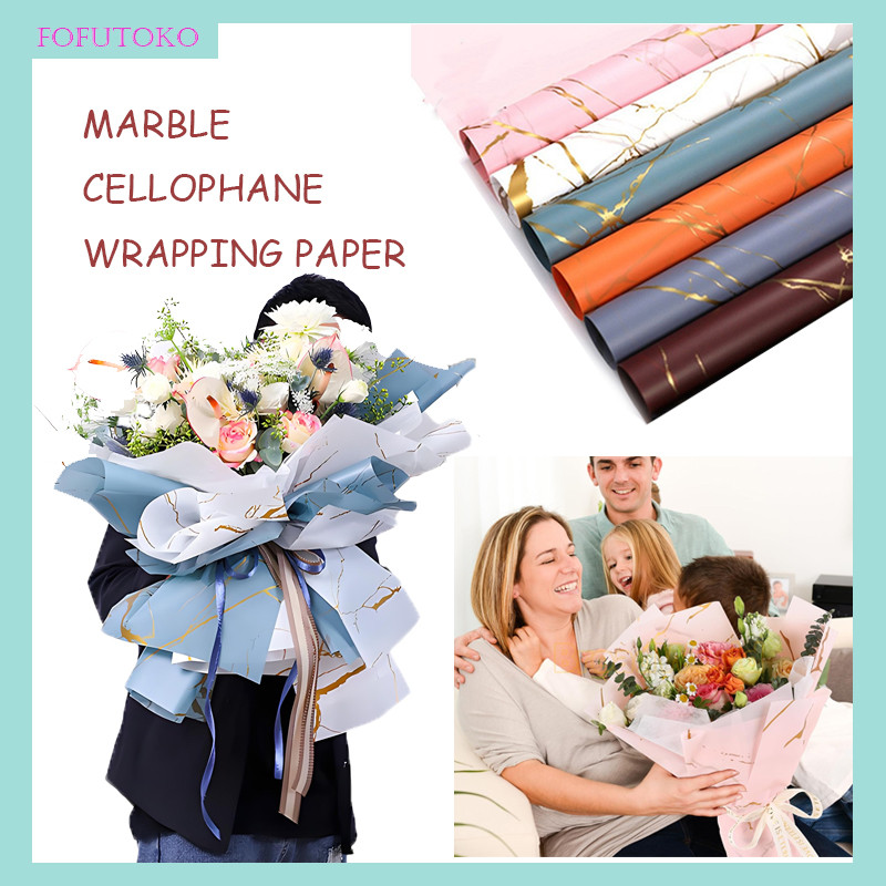 

Ertas Buket Bunga Motif Marble Emas / Marble Pattern Cellophane / Flower Wrapping Paper Golden Marble