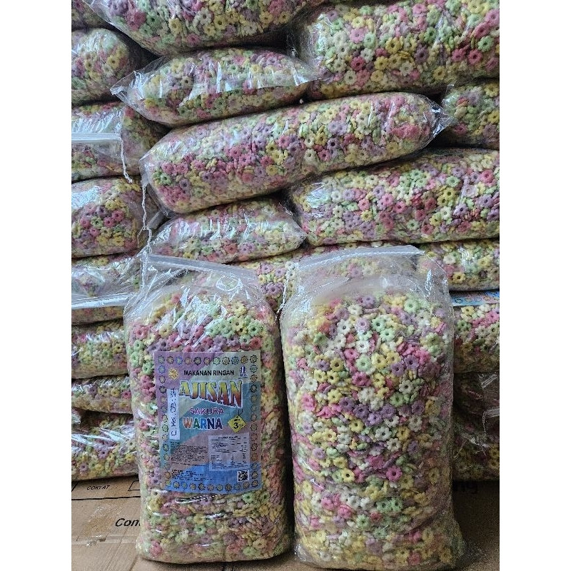 

TERMURAH Promo Ajisan snack jajan jadul 90an sakura ribut warna warni ajisan sakura 1kg sakura riri Termurah