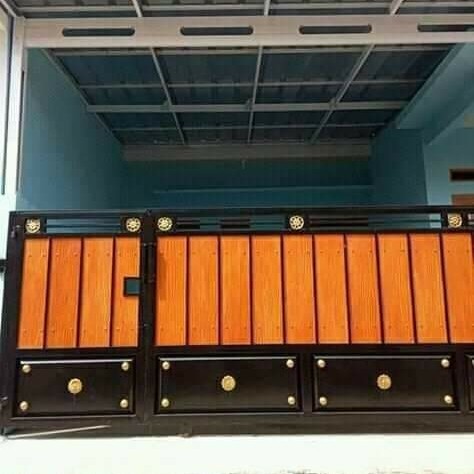 pagar minimalis kombinasi grc seratkayu di yambah ornamen.