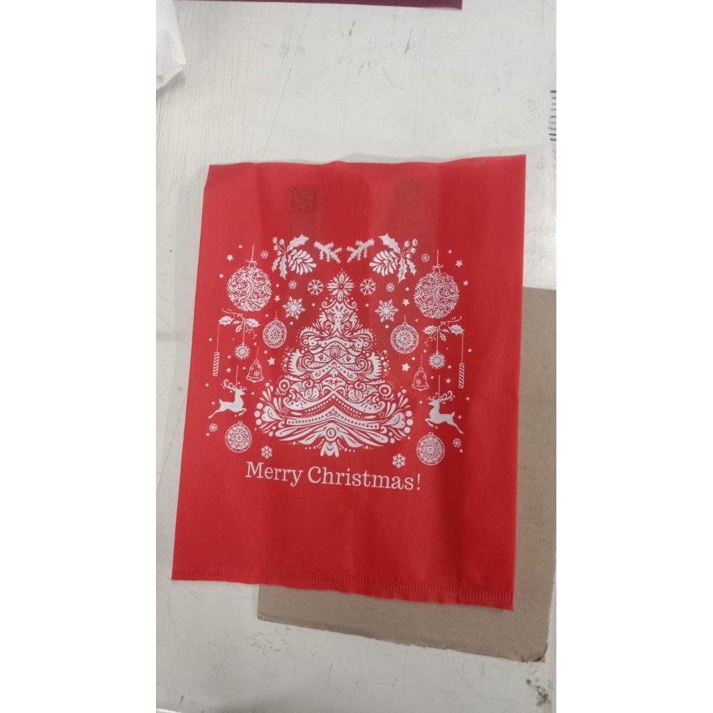 

Tas Kain Spunbond Tali Motif Natal 25x35x8 (Minim 12pcs) - natal merah