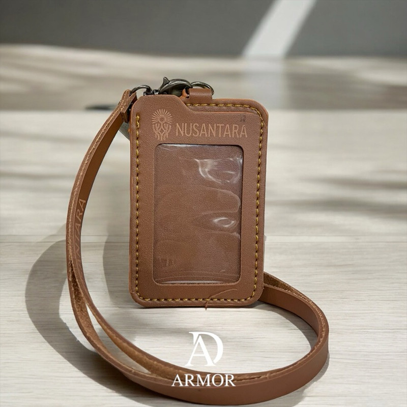 

Tempat id card kulit IKN Coklat muda lanyard id card kulit IKN