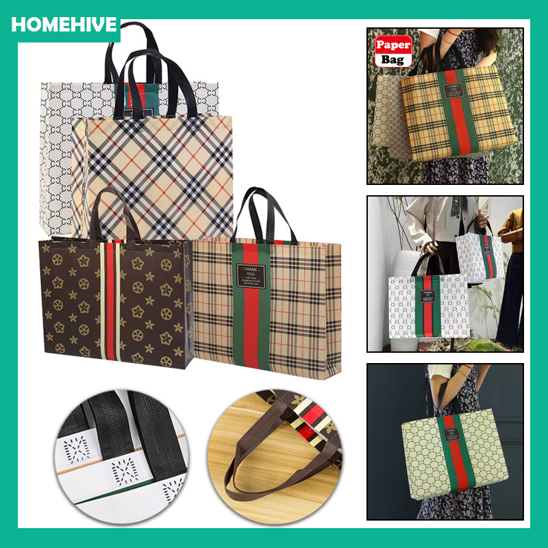 

Tas Hampers Tas Non Woven / Tas Belanja / Spoundbond Bag / Tote Bag Spunbond Kain Motif Premium / Goodie Bag Spunbond