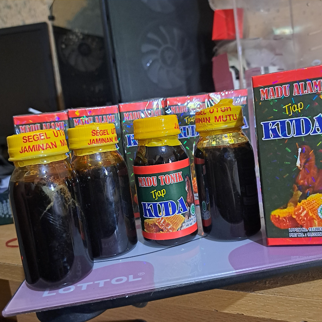 

(privasi) MADU KUAT SEGEL KUNING MADU HERBAL TONIK tjap KUDA 60ML