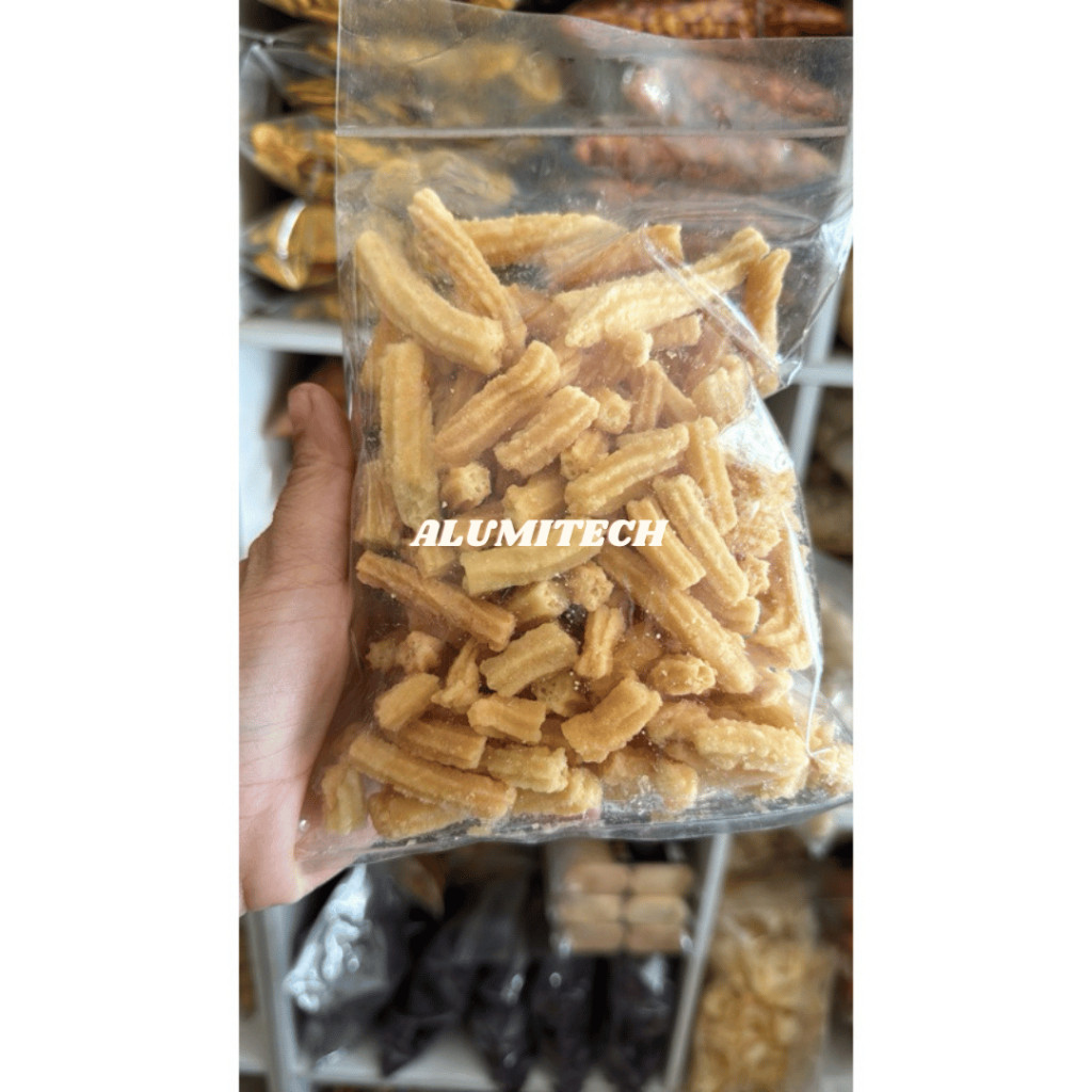 

PROMO TERMURAH akar kelapa / kue akar kelapa asin gurih / kue akar kelapa 1 kg / kue kelapa