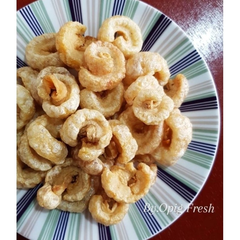 

Kerupuk Babi Samcan Cap Opig 100gr Gurih Renyah