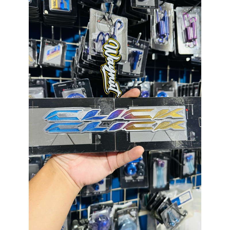 Emblem body click titanium